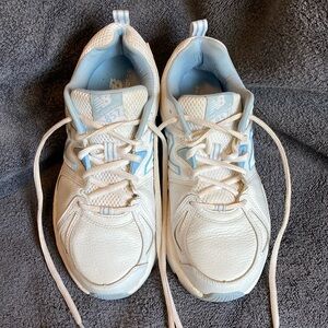 New Balance White and Light Blue 857 Athletic Shoes